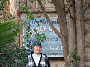 Sister Naomi, behind is the Jerusalem 7th Day church Of God (HQ Jerusalem, Israel)